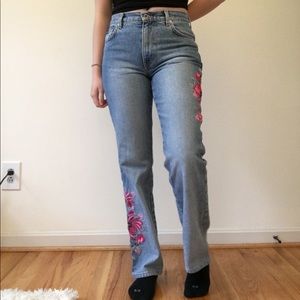 Embroidered pink flowered express jeans